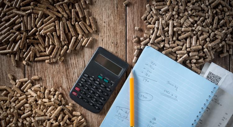 Pellet, calcolatrice e quaderno con i calcoli